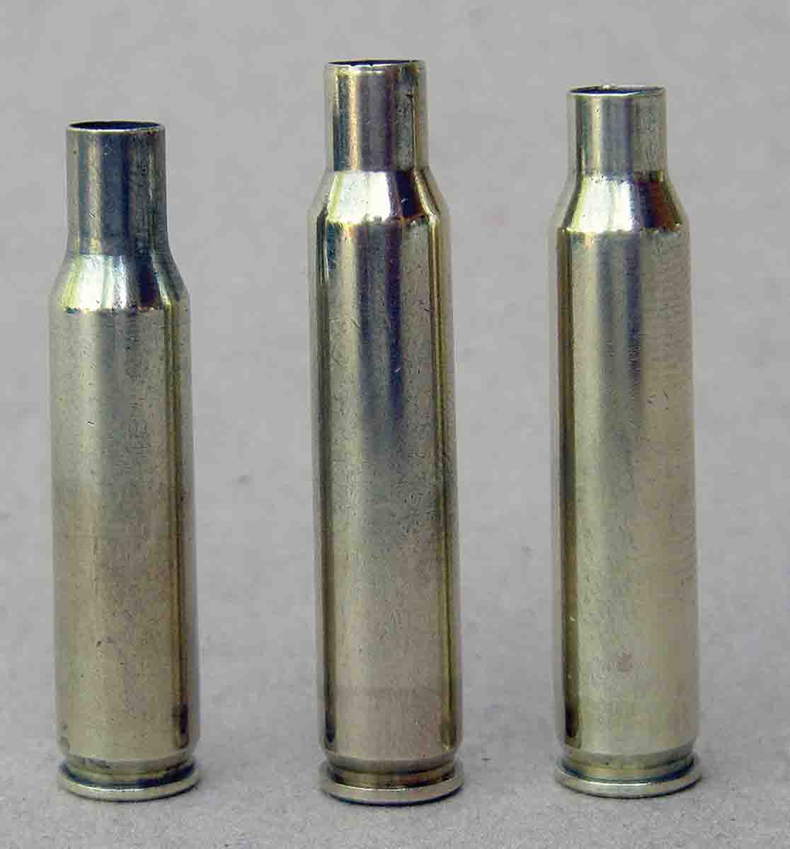 The .223 Remington (right) was based on the .222 Remington case (left). Its performance approached the .222 Remington Magnum (center) introduced in 1957.